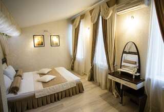 Гостиница Атриум Курган Номер люкс улучшенный с 1 двуспальной кроватью-12